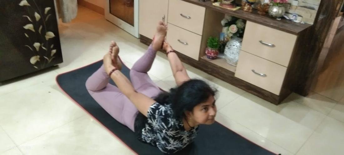 Jyoti Chaurasia, certified yoga instructor, in dhanurasana (bow pose)